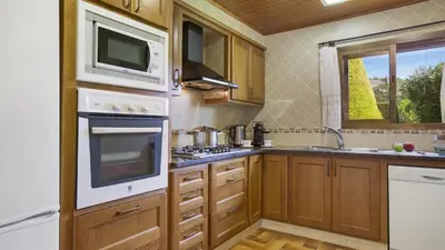Una cocina o zona de cocina en Villa Cip 14pax - Vidreres