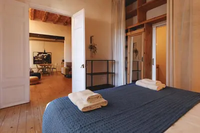 Cama o camas de una habitación en Bravissimo Carrer Nou, Cosy 2-bedroom apartment