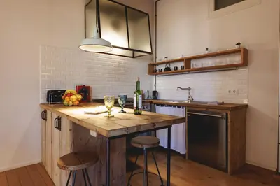 Una cocina o zona de cocina en Bravissimo Carrer Nou, Cosy 2-bedroom apartment