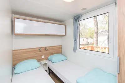 Cama o camas de una habitación en Albatross Mobile Homes on Camping Cala Canyelles