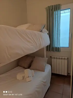 Cama o camas de una habitación en SATUNA BEACH CASA