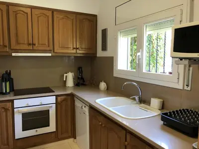 Una cocina o zona de cocina en Villa Rosa