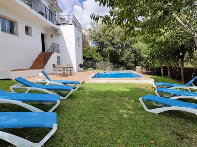 Jardín al aire libre en Villa Rosa