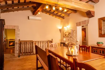 Zona de estar de Casa Rural en Rupià con piscina