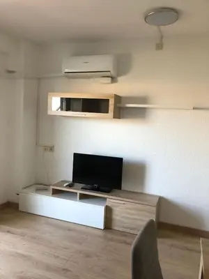 Una televisión o centro de entretenimiento en Beta's Beach