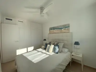 Cama o camas de una habitación en Montaber Apartments - Sant Pol de Mar
