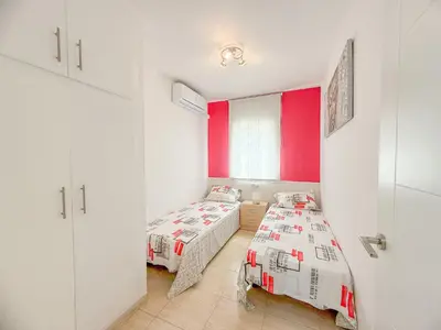 Cama o camas de una habitación en Club Villamar - Santelmo