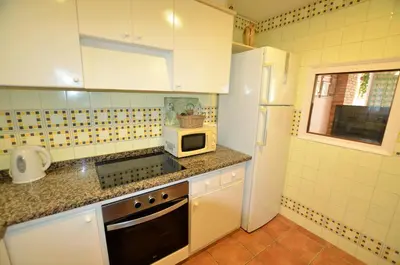 Una cocina o zona de cocina en Villa Isabel Lloret de mar