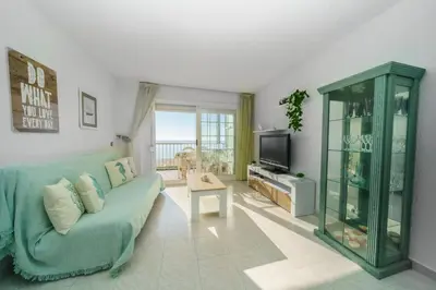 Una televisión o centro de entretenimiento en HomeHolidaysRentals Nice - Costa Barcelona