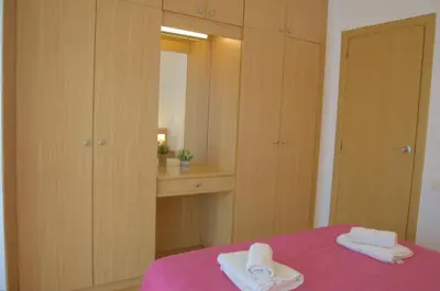 Cama o camas de una habitación en Apartamento Alba a 70 metros de la playa