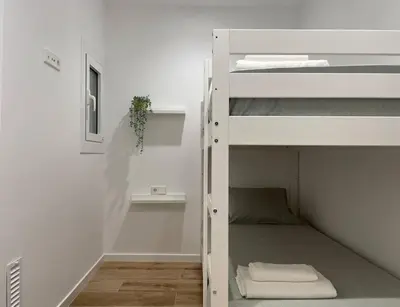 Cama o camas de una habitación en Apartamento nuevo céntrico frente al mar en Palamós