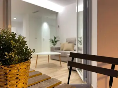 Zona de estar de Apartamento nuevo céntrico frente al mar en Palamós