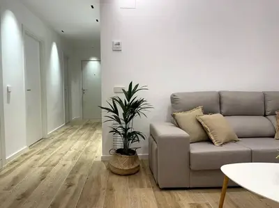 Zona de estar de Apartamento nuevo céntrico frente al mar en Palamós