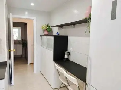 Una cocina o zona de cocina en Apartamento recién reformado con piscina y AC