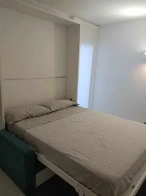 Cama o camas de una habitación en Apartamento recién reformado con piscina y AC