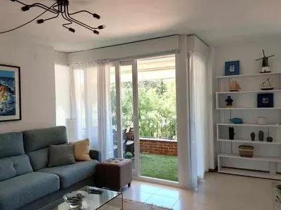 Zona de estar de Apartamento recién reformado con piscina y AC