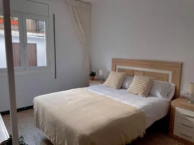 Cama o camas de una habitación en Can Jaume. Casa céntrica y cerca de la naturaleza.