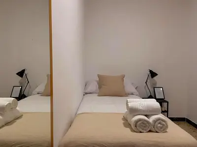 Cama o camas de una habitación en Can Jaume. Casa céntrica y cerca de la naturaleza.