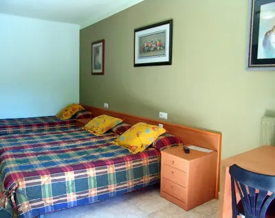Cama o camas de una habitación en Hotel Pinxo