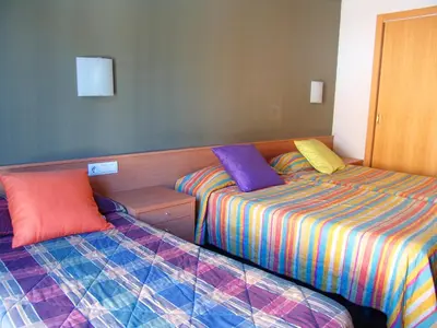 Cama o camas de una habitación en Hotel Pinxo