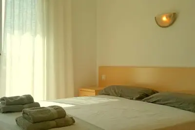Cama o camas de una habitación en Apartamento Adara a 200 metros de la playa