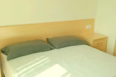 Cama o camas de una habitación en Apartamento Adara a 200 metros de la playa