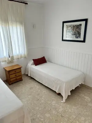 Cama o camas de una habitación en Isard 4 bis Apartamento junto a la playa