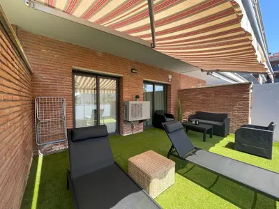 Zona de estar de Apartamento renovado cerca de la playa