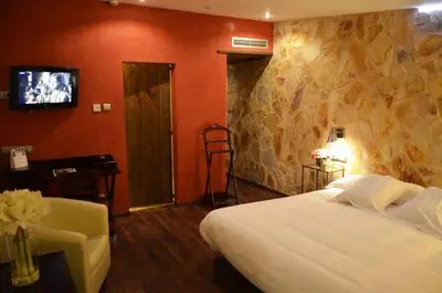 Cama o camas de una habitación en Hotel Galena Mas Comangau