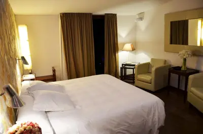 Cama o camas de una habitación en Hotel Galena Mas Comangau
