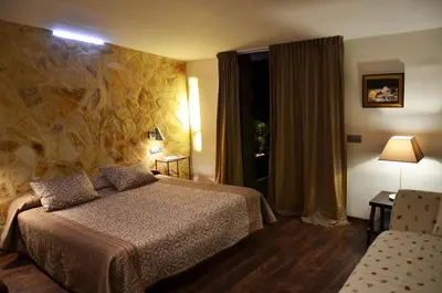Cama o camas de una habitación en Hotel Galena Mas Comangau