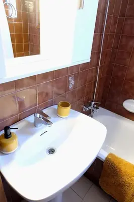 Un baño de Apartamento con piscina L' Áncora