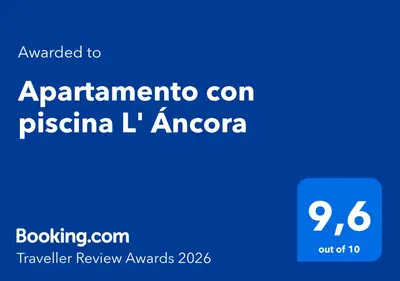 Certificado, premio, señal o documento que está expuesto en Apartamento con piscina L' Áncora