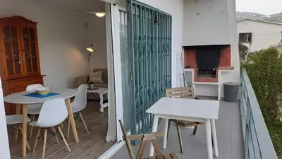 Una televisión o centro de entretenimiento en Apartment Oli - Lloret de Mar