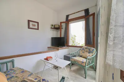 Una televisión o centro de entretenimiento en 1Auro - Calella de Palafrugell
