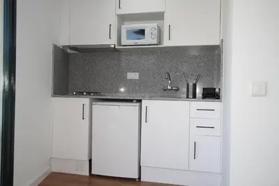 Una cocina o zona de cocina en Apartamentos El Sol II
