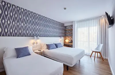 Cama o camas de una habitación en Hotel Anabel