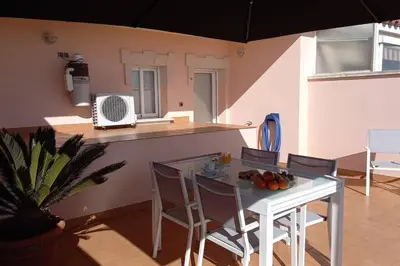 Un balcón o terraza de Atico duplex en Malgrat de Mar