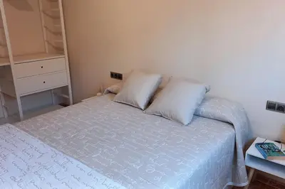 Cama o camas de una habitación en Atico duplex en Malgrat de Mar