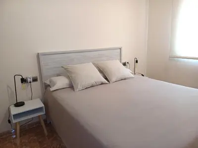 Cama o camas de una habitación en Atico duplex en Malgrat de Mar