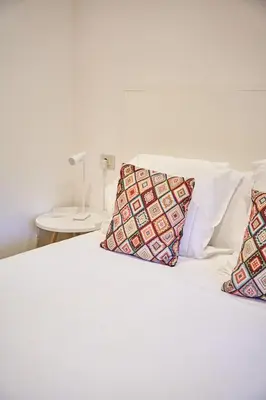 Cama o camas de una habitación en NM Suites by Escampa Hotels
