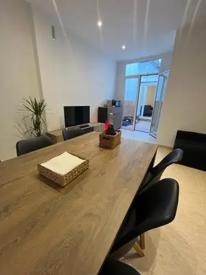 Una televisión o centro de entretenimiento en Apartamento St Zenon