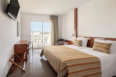 Cama o camas de una habitación en htop Platja Park #htopFun