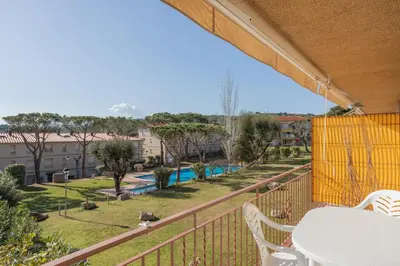 Piscina en o cerca de Apartamentos CASA MAREA La Fosca parking y piscina