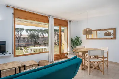 Zona de estar de Apartamentos CASA MAREA La Fosca parking y piscina