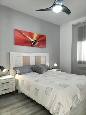 Cama o camas de una habitación en Casa junto al mar