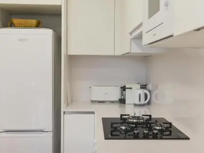 Una cocina o zona de cocina en Emporion - Apt, KPolitur