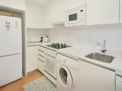 Una cocina o zona de cocina en Emporion - Apt, KPolitur