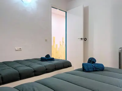 Cama o camas de una habitación en Vivalidays Kaylo - Fenals - LLoret de Mar