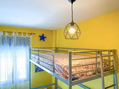 Cama o camas de una habitación en Vivalidays Elia - Fenals - LLoret de Mar